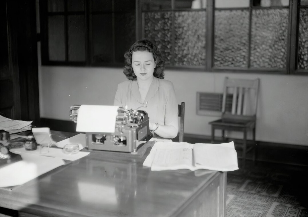 mystery writer at desk